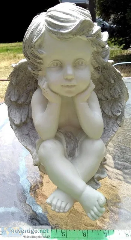 Seated Cherub ornamental figurine
