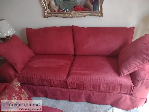 Red Sofa With 4 Cushioned Pillows
