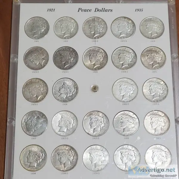 A set of Peace dollar coins for sale