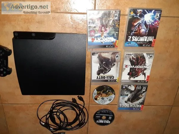Sony PS3 with 7 games one controller power cables