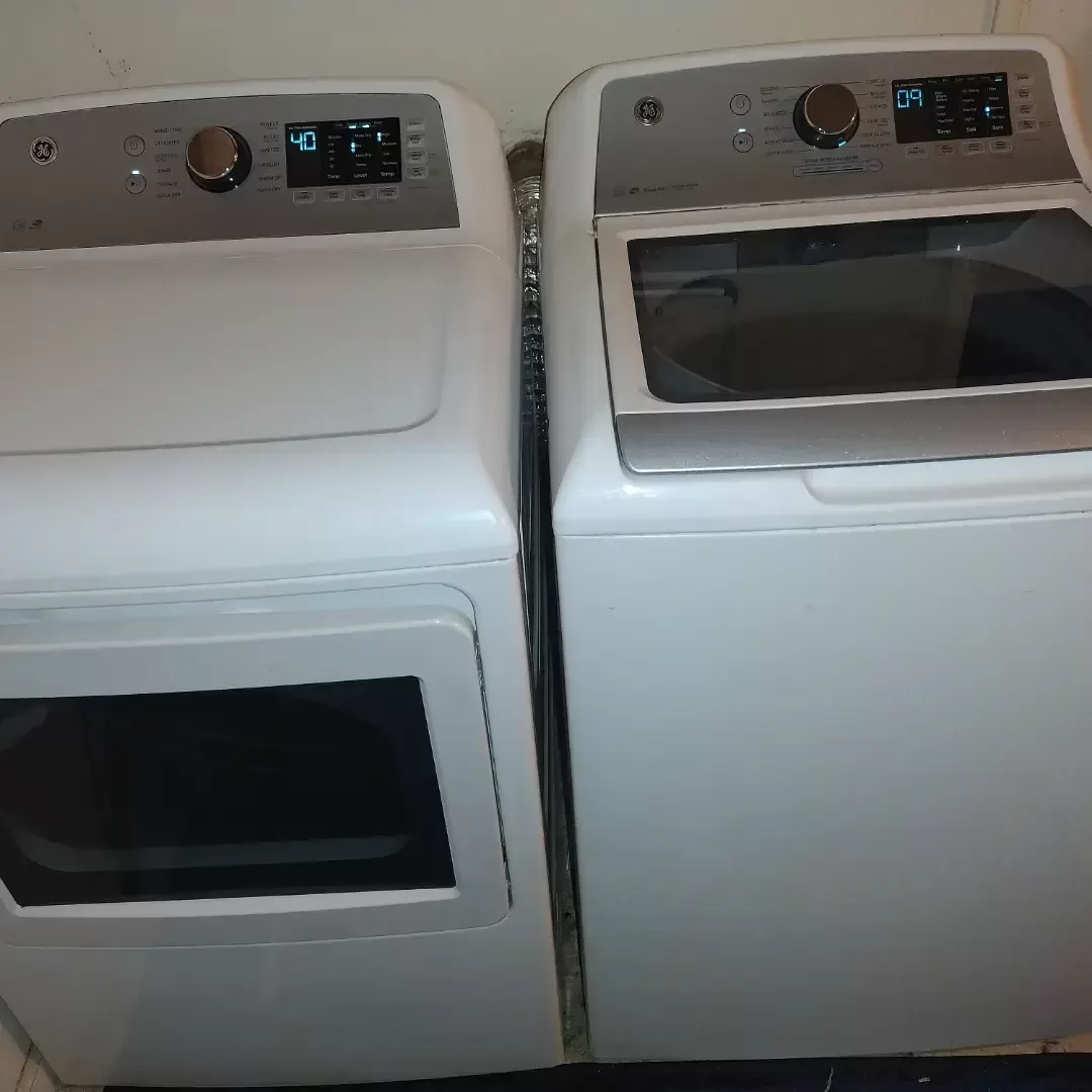 GE top load washer with agitator and matching front load dryer w