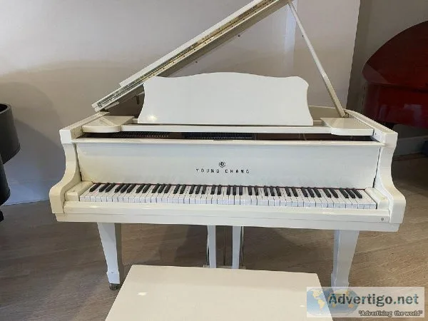 Giving away this baby grand piano