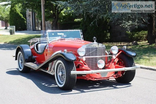 24415 1968 Excalibur Roadster Red