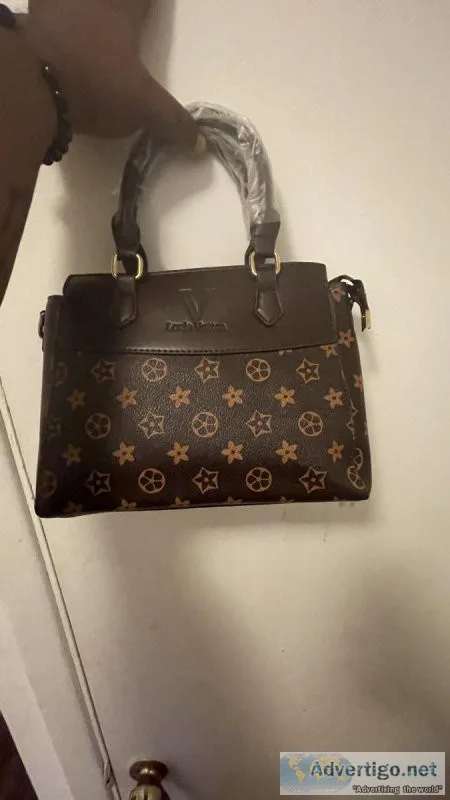 Louis Vuitton bag brand new with no scratches and wrapped up