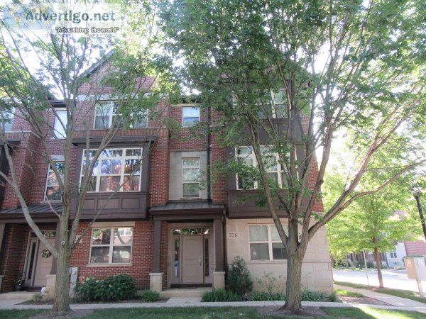 Corner 3 story brick and stone townhome in Desirable Aspen Point