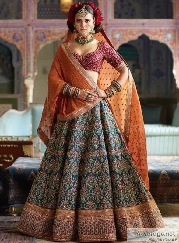 Blue Heavy Embroidered Silk Wedding Lehenga Choli