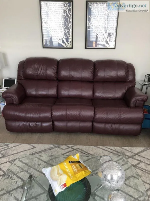 Leather Reclining Sofa and Love Seat.