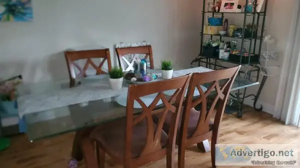 Glass dining table chairs and Baker s Rack