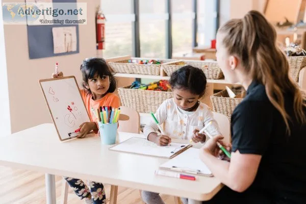 How early learning centre encouraging children to try new things