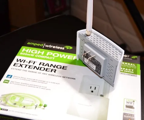How do you reset the amped wireless extender?