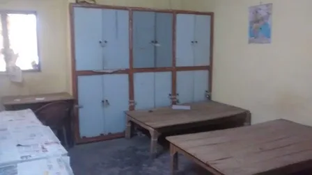 Jankipuram lucknow room with bed, table, light, almira, fan etc 