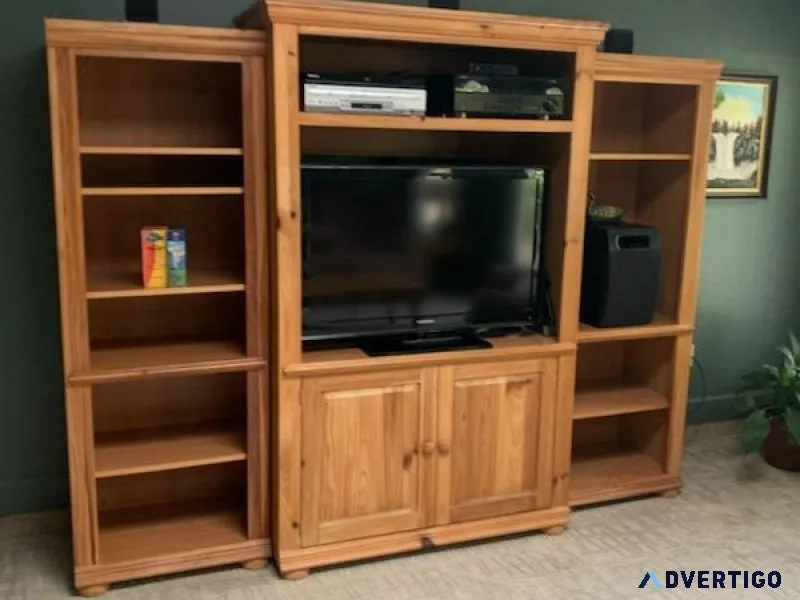 Entertainment center with matching coffee and end table