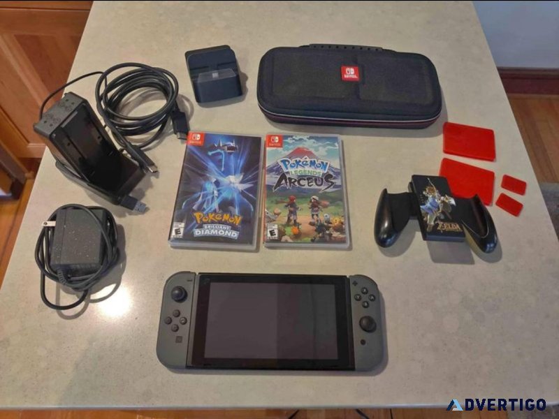 Nintendo Switch With Pokemon Games And Slim Dock