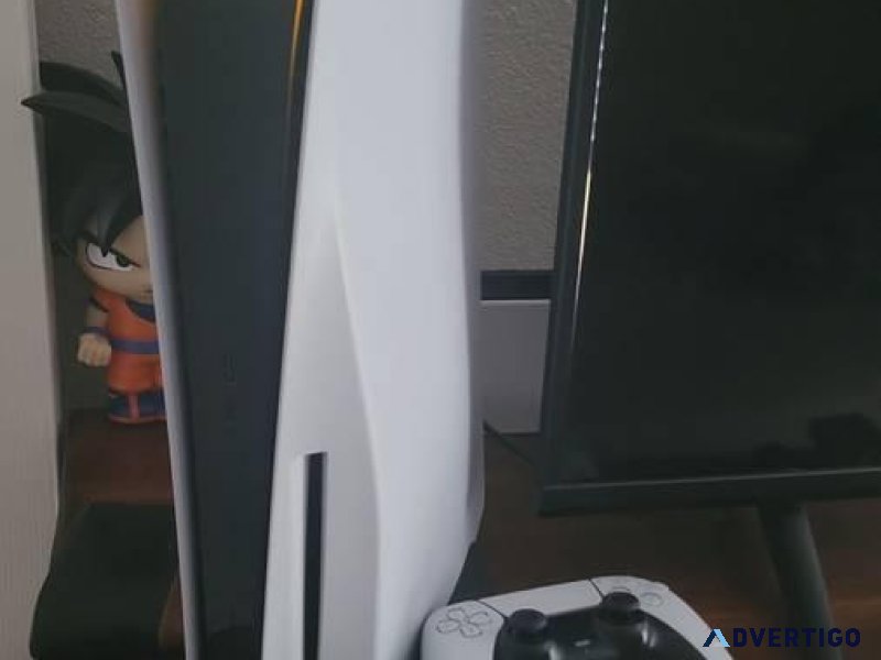 PS5 with 2 controllers and 3 games (FIFA 24 COD and NBA)