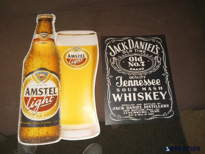 Lot 2 signs jack Daniel s and Amstel beer