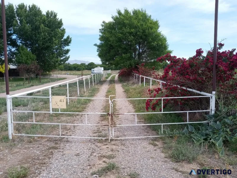 3 Acres w house garage buildings corrals