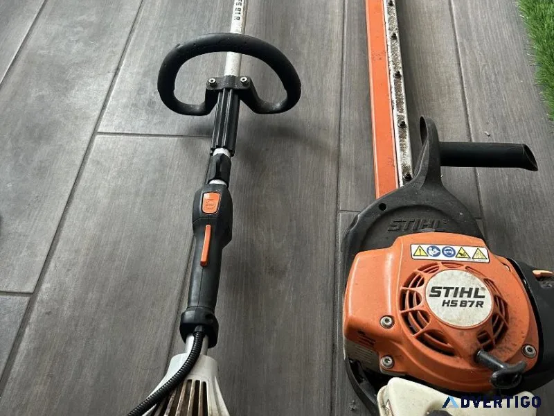 Mowing lawns trimming bushes and plants