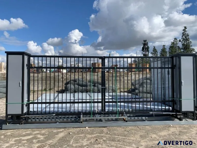 UNUSED RETRACTABLE WROUGHT IRON GATES WCOLUMNS