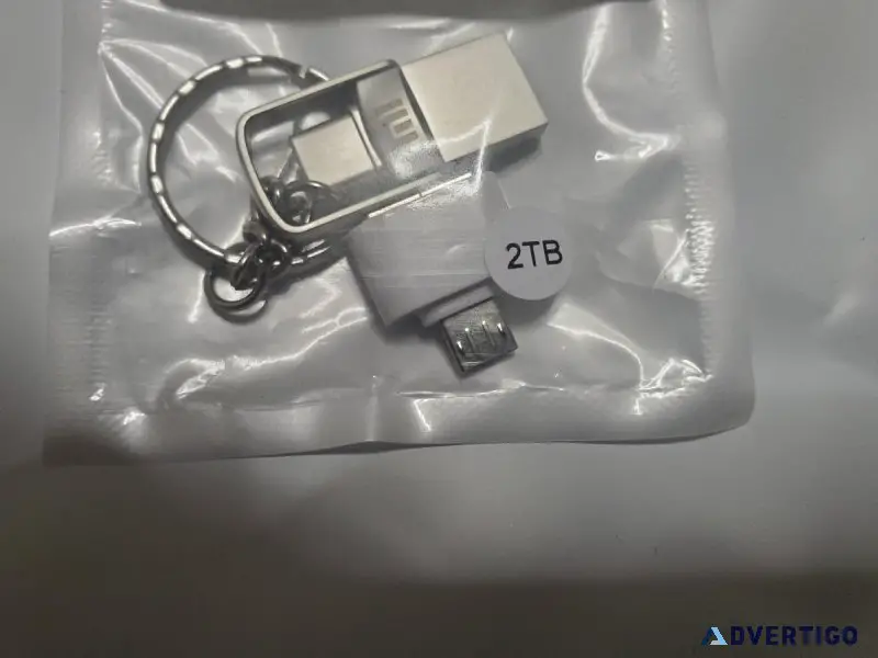 2 TB key chain thumb drive with adapter.