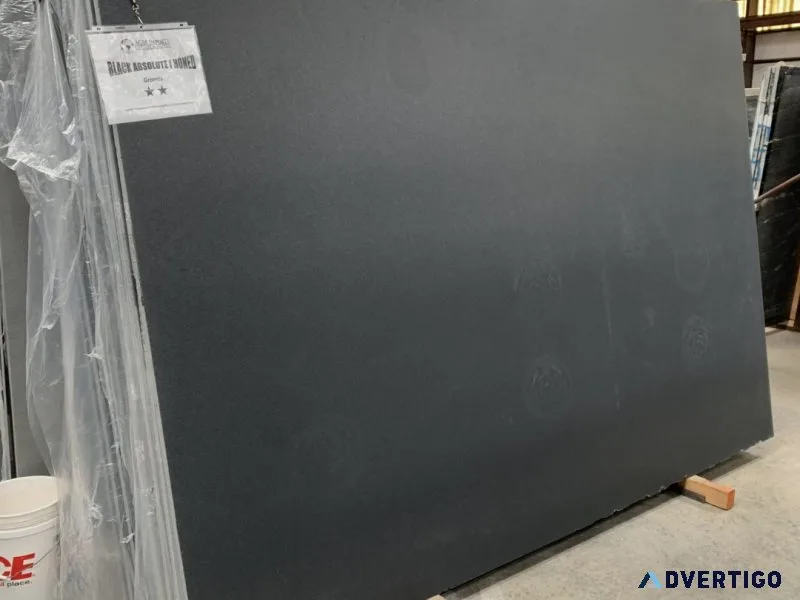 Premium black granite slab with elegant natural white veins – po