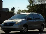 Look at this clean  2005 Toyota Sienna 140 k on it and  silver  