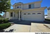 home is located in Green Valley Ranch with a massive floor plan