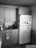 IKEA kitchen cabinets counters sink fridge microwave