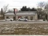 Hartland Twp Great location right on M-59 less than one