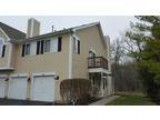 Woodstock Two BR One BA This sizable end unit in The Trees is a