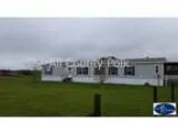 Two BR, waterfront park model on large, waterfront lot in award 