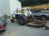 Bush Hogging with 16 up reach arm