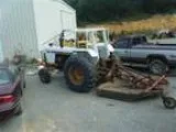 Bush Hogging with 16 up reach arm