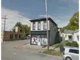 Commercial storefront 2 apartments and huge garage (1301 east ma