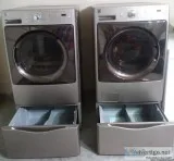 Kenmore Elite Front Load washer and dryer with pedastals