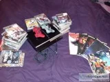 Ps3  36 games  5 game guides  2 controllers with two wires