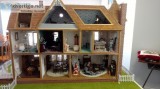 Dollhouse with furniture pictures etc.