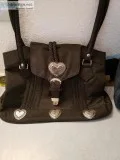 A new purse with jewelry in it