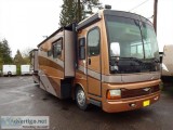 2005 Discovery 39L Quad Slide Motorized Class A