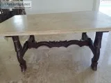 Dining table with natural stone top