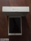 Apple iPad mini 3 64GB gold color with glass screen protector.