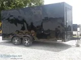 Enclosed motorcycle haulers