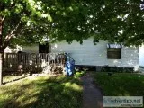 Land and fixer upper mobile home for sale