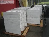 Lot of white plastic folding chairs
