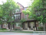CONTEMPORARY TRI-LEVEL BRICK TOWNHOME WITH 3 BEDROOMS 2.1 BATHRO