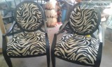 2 zebra pattern chairs