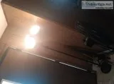 Oscillating fan and tri lamp.