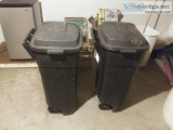 2 Rubbermaid trash cans