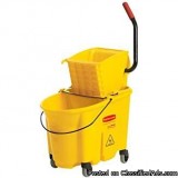 Rubbermaid Commercial WaveBrake 35 Qt. Plastic Mop Bucket with W