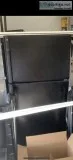 GE fridge black standard style.