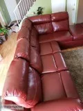 Sectional recliner sofa with storage bin